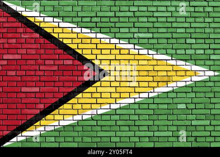 Flagge von Guyana auf Ziegelwand gemalt Stockfoto