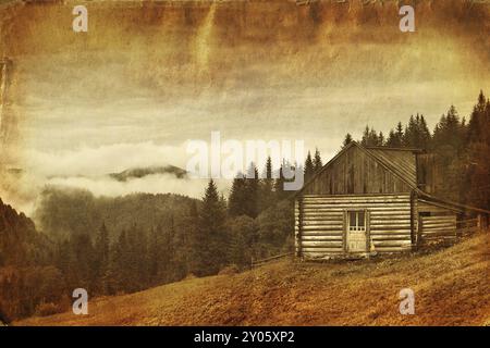 Retro-Stil Bild des verlassenen Holzhaus am Berghügel Stockfoto