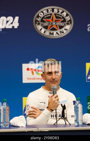 Austin, USA. 31. August 2024. Ian James vom Heart of Racing Team (27) spricht auf der Pressekonferenz nach dem Qualifying-Rennen in Lone Star Le Mans am 31. August 2024 auf dem Circuit of the Americas. Der Lone Star Le Mans kehrt zum ersten Mal seit 2020 nach Austin, TX, zurück. (Foto: Stephanie Tacy/SIPA USA) Credit: SIPA USA/Alamy Live News Stockfoto