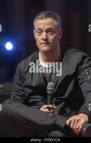 BONN, 19. MAI 2018: Tahmoh Penikett (*1975, Schauspieler, Battlestar Galactica) berichtet über seine Erfahrungen in Battlestar Galactica auf der FedCon 27, A Stockfoto