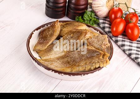 Gebackene Stachelrochen mit Öl und Gewürzen Stockfoto