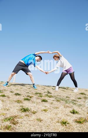 Männer und Frauen bereiten sich auf Sport vor Stockfoto