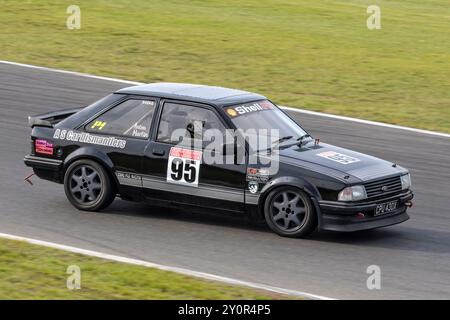 Anton Martin 1982 in seinem Ford Escort Mk3 RS16i während des Classic Touring Car Racing Club Rennens 2023 in Snetterton, Norfolk, Großbritannien Stockfoto