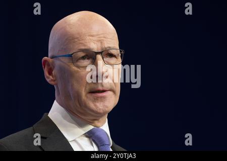 Aktenfoto vom 09/24 des Ersten Ministers John Swinney auf der SNP-Jahreskonferenz im Edinburgh International Conference Centre. Die schottische Regierung bleibt "optimistisch", dass sie "das Leben von Kindern und ihren Familien verbessern kann", sagte der erste Minister vor seinem ersten Regierungsprogramm. Ausgabedatum: Mittwoch, 4. September 2024. Stockfoto