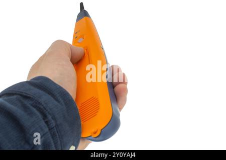 Hand halten eines elektrischen Prüfgeräts Stockfoto