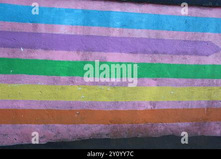 Bunter Betonwand Textur Hintergrund in heller Farbmalerei. Stockfoto