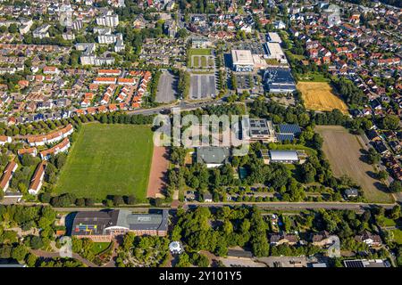 Luftbild, Freiherr-vom-Stein-Gymnasium Hamm und Wiesenfläche, hinten Westpress Arena und beta Finanz Eissportarena Eissporthalle mit Moderniesierung und Renovierungsarbeiten, unten der Eingangsbereich Haupteingang Maximilianpark, Uentrop, Hamm, Ruhrgebiet, Nordrhein-Westfalen, Deutschland ACHTUNGxMINDESTHONORARx60xEURO *** Luftansicht, Freiherr vom Stein Gymnasium Hamm und Wiesenbereich, hinter Westpress Arena und Beta Finanz Eissportarena Eisbahn mit Modernisierungs- und Sanierungsarbeiten, unterhalb des Eingangsbereichs Haupteingang Maximilianpark, Uentrop, Hamm, Ruhrgebiet, Nordrhein-Westfalen, Germa Stockfoto