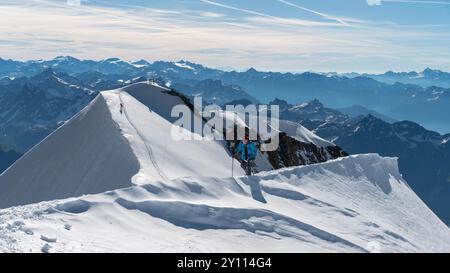 Bergsteiger auf dem Gipfel des Piz Palü Stockfoto