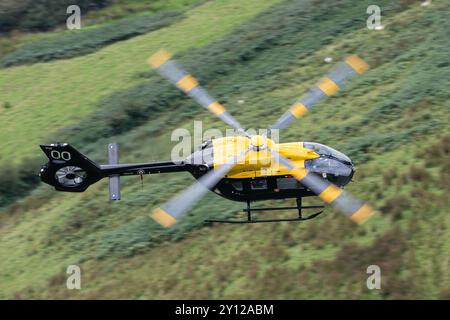 Juno HT1 der Royal Air Force fliegt vorbei an „The Spur“ Mach Loop, Dolgellau, Großbritannien, 4. September 2024 (Foto: Cody Froggatt/News Images) Stockfoto