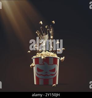 Gruselige Zombie-Hand aus einem vollen Popcorn-Eimer, Horrorfilme und Halloween-Konzept Stockfoto