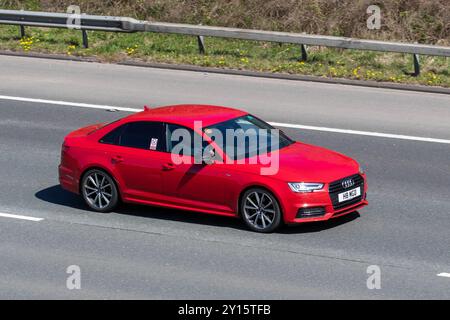 2017 Red Audi A4 S Line TDI S-A; Fahren auf der M6, UK Stockfoto