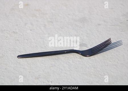 Schwarzes Plastikutensil für Fast Food Stockfoto