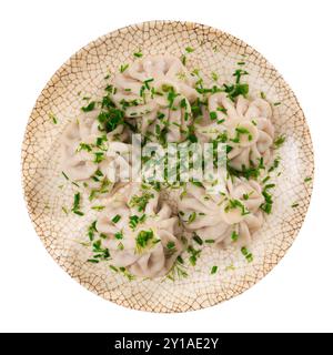 Auf dem Teller gibt es eine Portion Khinkali - ein nationales georgisches Gericht aus Teig und Fleisch Stockfoto