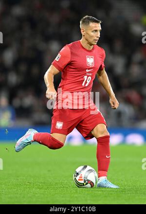 Glasgow, Großbritannien. September 2024. Przemysław Frankowski von Polen während des Spiels der UEFA Nations League im Hampden Park, Glasgow. Der Bildnachweis sollte lauten: Neil Hanna/Sportimage Credit: Sportimage Ltd/Alamy Live News Stockfoto