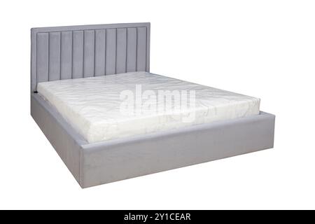 Doppelbett mit weichem Kopfteil. Gepolsterte Möbel. Stockfoto