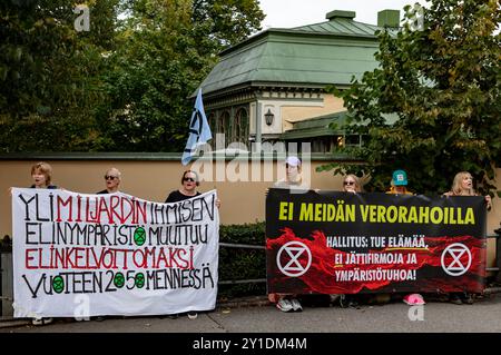 Demonstration des Siedepunkts (Kiehumispiste) der Extinction Rebellion Finland (Elokapina) in Helsinki, Finnland am 3. September 2024. Stockfoto