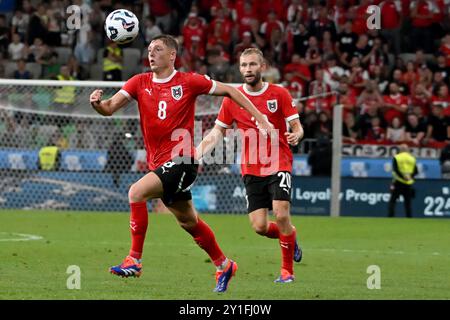 Ljubljana, Slowenien. September 2024. Ljubljana, Slowenien, 6. September 2024: Alexander Prass von Österreich (L) in Aktion während der UEFA Nations League, Liga B Gruppe B3, Spiel zwischen Slowenien und Österreich im Stadion Stozice, Ljubljana, Slowenien. (Igor Kupljenik/SPP) Credit: SPP Sport Press Photo. /Alamy Live News Stockfoto