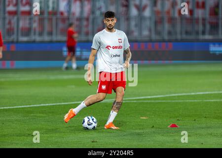 Osijek, Hrvatska. September 2024. Polnische Spieler wärmen sich vor dem Fußballspiel zwischen Polen und Kroatien in der Gruppe A, der zweiten Runde der UEFA League of Nations am 08. September 2024 in der Opus Arena in Osijek, Kroatien, auf. Foto: Borna Jaksic/PIXSELL Credit: Pixsell/Alamy Live News Stockfoto