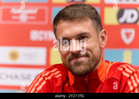 PODGORICA, Montenegro. September 2024. Wales' Kapitän Aaron Ramsey während einer Pressekonferenz in Podgorica, Montenegro vor dem Spiel der UEFA Nations League 2025 zwischen Montenegro und Wales im City Stadium Nikšić am 9. September 2024 (PIC von John Smith/FAW) Credit: Football Association of Wales/Alamy Live News Stockfoto