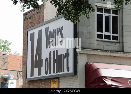 14 Jahre Verletzte Poster in Coventry Stockfoto