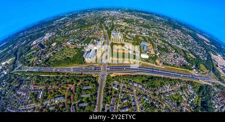 Luftbild, Straßenverkehr Autobahn A448 und Brücke der Universitätsstraße, Seven Stones Quartier und Apartment-Neubau eines Gebäudekomplexes in Modulbauweise am Community Campus Smart Forward, Vonovia Zentrale, Erdkugel, Fisheye Aufnahme, Fischaugen Aufnahme, 360 Grad Aufnahme, winzige Welt, kleiner Planet, Fischaugenbild, Wiemelhausen, Bochum, Ruhrgebiet, Nordrhein-Westfalen, Deutschland ACHTUNGxMINDESTHONORARx60xEURO *** Luftaufnahme, Straßenverkehrsstraße A448 und Brücke der Universitätsstraße, Seven Stones Quartier und Wohnung Neubau eines Gebäudekomplexes in modularer Bauweise an der Stockfoto