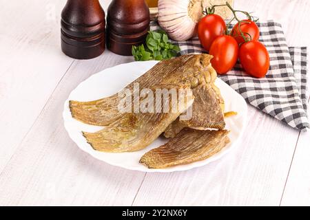 Gebackene Stachelrochen mit Öl und Gewürzen Stockfoto