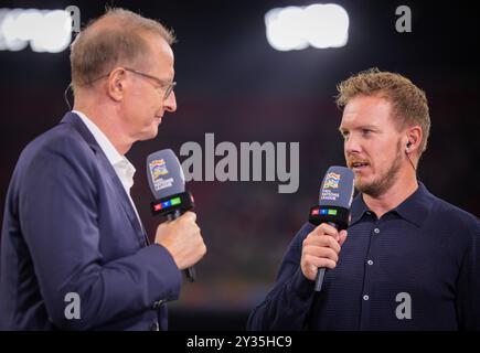 Amsterdam, Niederlande. September 2024. Florian König (RTL) Trainer Julian Nagelsmann (Deutschland) Niederlande - Deutschland Niederlande - Deutschland Stockfoto