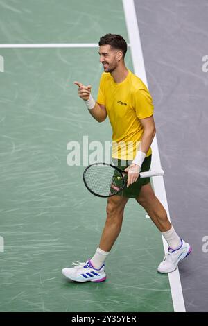 Valencia, Spanien. September 2024. VALENCIA, SPANIEN - 12. SEPTEMBER: Thanasi Kokkinakis aus Australien feiert nach seinem Sieg während der Davis Cup Finals Gruppenphase 2024 Valencia Spiel zwischen Australien und Tschechien im Pabellon Fuente de San Luis am 12. September 2024 in Valencia, Spanien. (Foto von Francisco Macia/Photo Players Images/Magara Press) Credit: Magara Press SL/Alamy Live News Stockfoto