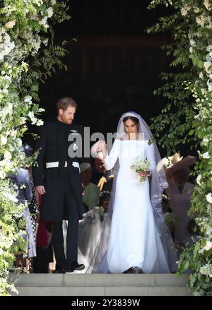 Aktenfoto des Herzogs von Sussex im Alter von 33 Jahren. Aktenfoto vom 19./05/18 von Meghan Markle und Prinz Harry auf den Stufen der St. George's Chapel in Windsor Castle nach ihrer Hochzeit. Der Herzog von Sussex feiert am Sonntag seinen 40. Geburtstag. Ausgabedatum: Freitag, 13. September 2024. Stockfoto