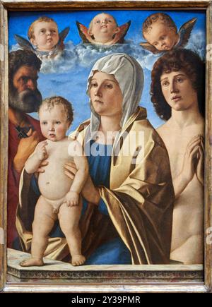 Die Jungfrau und das Kind zwischen St. Peter und St. Sebastian, Öl auf Platte (Pappel), um 1487, Giovanni BELLINI, Connu à Venise en 1459 - Venise, 15 Stockfoto