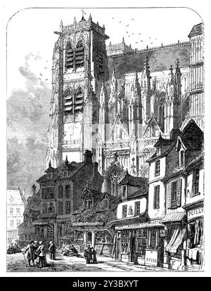 St. Wolfran, Abbeville, 1871. Die Fassade ist ein wahrhaft edles Exemplar der extravaganten Gotik. Es ist mit einer Fülle von reichsten Arbeiten bedeckt, wie dem einfachen Meißel und dem zarten Geschmack der französischen Maurer, die es mit Freude zu erreichen scheinen. Diese große Westfront wird von zwei Türmen von großer Schönheit flankiert, während das Äußere des Kirchenschiffs, das durch fliegende Stützen und Zinnen mit den Wänden der Seitenkapellen des Ganges verbunden ist, alle mit aufwendigen Trazereien bereichert, einen Blick von einzigartiger Eleganz und Anmut bietet. Eine Illustration des Südwestwinkels der Kathete Stockfoto