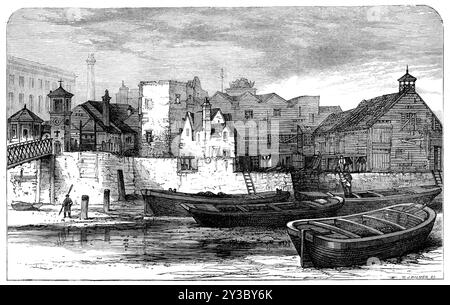 Alte Häuser in Nine-Elms, Lambeth, [South London], 1871. "Die Ufer der Themse... haben eine wundervolle Umgestaltung durchlaufen... auf der Surrey-Seite, und nur in weniger verbesserten oder modernisierten Teilen von Lambeth und Southwark, oder vielleicht in Rotherhithe, finden wir noch einige seltsame Beispiele des alten Baustils, mit den hervorragenden oberen Holzkonstruktionen, wie Heckkabinen von alten Schiffen, den Balkonen, die von Pfosten gestützt wurden, und den Giebeldächern, die früher so üblich waren. Das Haus scheint die schwere, feuchte Luft des Flusses zu beherbergen und über seinem schleimigen Rand bis p Stockfoto