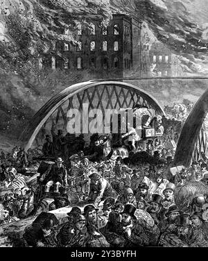 The Chicago Fire: The Randolph-Street Bridge, 1871. „Unsere Titelseite Engraving zeigt die Szene auf der Randolph-Street-Brücke über den Chicago River am Montag, den 9. Oktober, als eine Vielzahl von verängstigten Menschen - Männer, Frauen und Kinder - sich beeilten, aus dem brennenden Viertel der Stadt zu fliehen, viele von ihnen trugen wertvolle Gegenstände oder persönliche Gegenstände in tragbarer Größe und Form oder was auch immer für ihren persönlichen Komfort und für den ihrer Familie zu suchen schien.“ Aus Illustrated London News, 1871. Stockfoto