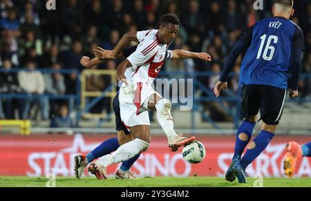 Denderleeuw, Belgien. September 2024. Muhammed Badamosi kämpft um den Ball während eines Fußballspiels zwischen FCV Dender EH und Standard de Liege in Denderleeuw am siebten Tag der Saison 2024-2025 der ersten Liga der „Jupiler Pro League“ der belgischen Meisterschaft, Freitag, den 13. September 2024. BELGA PHOTO VIRGINIE LEFOUR Credit: Belga News Agency/Alamy Live News Stockfoto