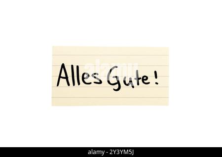 Alles Gute! Deutsches Wunschwort zur Kommunion auf beigefarbenem Papier, handgeschrieben. Isoliert auf weiß. Freier Platz für Text. Stockfoto