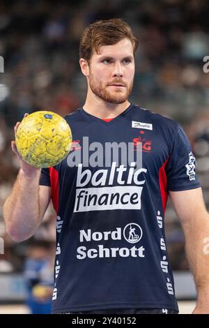 Johannes GOLLA (SG Flensburg-Handewitt, #04) vor dem Spiel beim warm-up TVB Stuttgart (TVB) vs. SG Flensburg-Handewitt (SGF), Handball, Maenner, Daikin 1. Handball-Bundesliga (HBL), 2. Spieltag, Spielzeit 2024/2025, 15.09.2024 Foto: Eibner-Pressefoto/Oliver Schmidt Stockfoto