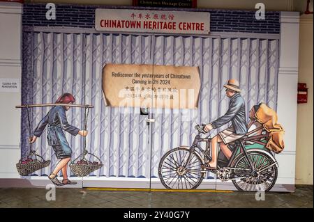 Ein gemaltes Wandgemälde im Chinatown Heritage Centre in der Pagoda Street in Chinatown, einem alten historischen chinesischen Viertel in Singapur. Viel von dem alten Col Stockfoto