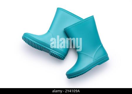 Blaue Gummistiefel isoliert auf weißem Hintergrund. Kinderschuhe für Wasser. Stockfoto