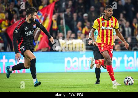 Duje CALETA-CAR von Lyon und Andy DIOUF von Lens während des französischen Meisterschaftsspiels Ligue 1 zwischen RC Lens und Olympique Lyonnais am 15. September 2024 im Bollaert-Delelis-Stadion in Lens, Frankreich Stockfoto