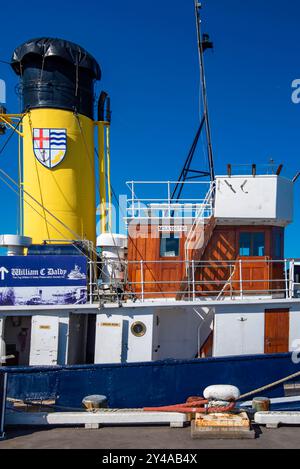 Der William C Daldy, der hier an der Devonport Wharf in Auckland gesehen wird, ist ein mit Kohle befeuerter Doppelschnecken betriebener Dampfschlepper, der von 1936 bis 1977 im Hafen arbeitete Stockfoto