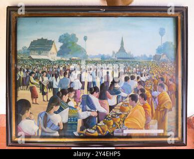 Ein Ölgemälde, das ein großes fest und Essen im buddhistischen Tempel zeigt. In Pha That Luang in Vientiane, Laos. Stockfoto