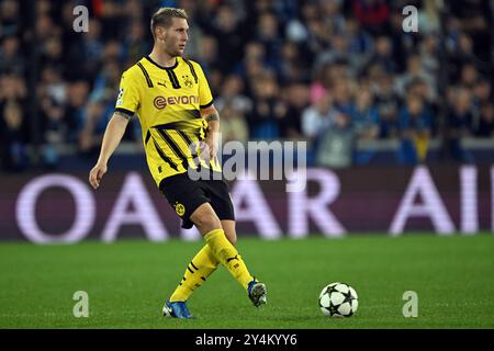 18. September 2024, Belgien, Brügge: Fußball: Champions League, FC Brügge - Borussia Dortmund, Vorrunde, Spieltag 1, Jan Breydel Stadion, Dortmunder Niklas Süle spielt den Ball. Foto: Federico Gambarini/dpa Stockfoto