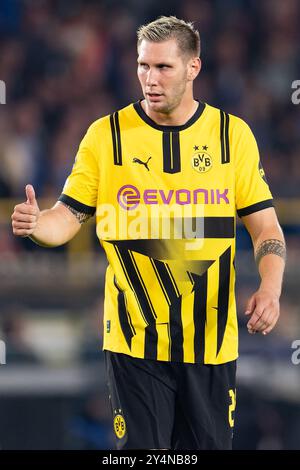 Brügge, Belgien. September 2024. BRÜGGE, BELGIEN - 18. SEPTEMBER: Niklas Sule aus Borussia Dortmund feiert beim Spiel der UEFA Champions League 2024/25 Phase MD1 zwischen Club Brugge KV und Borussia Dortmund im Jan Breydelstadion am 18. September 2024 in Brügge, Belgien. (Foto: Joris Verwijst/BSR Agency) Credit: BSR Agency/Alamy Live News Stockfoto