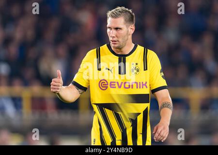 Brügge, Belgien. September 2024. BRÜGGE, BELGIEN - 18. SEPTEMBER: Niklas Sule aus Borussia Dortmund feiert beim Spiel der UEFA Champions League 2024/25 Phase MD1 zwischen Club Brugge KV und Borussia Dortmund im Jan Breydelstadion am 18. September 2024 in Brügge, Belgien. (Foto: Joris Verwijst/BSR Agency) Credit: BSR Agency/Alamy Live News Stockfoto