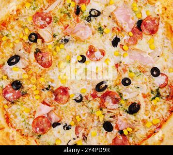 Leckere Pizza, Hintergrund oder Textur aus der Nähe Stockfoto