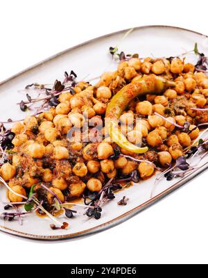 Scharfes Kichererbsencurry, chana Masala oder Choley in Teller mit Chapati Stockfoto