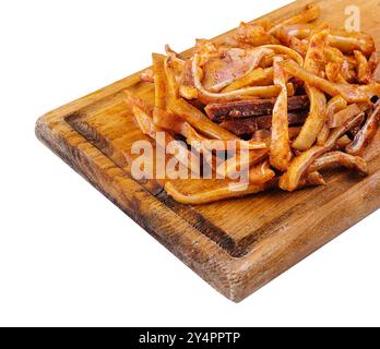 Leckerer Snackteller mit Schweineohren auf weiß Stockfoto