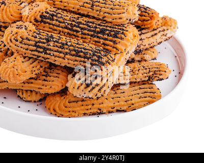 Bröckelige Kekse mit Mohnsamen auf Teller Stockfoto