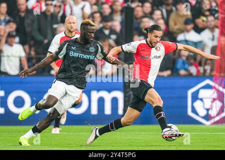 Rotterdam, Niederlande. September 2024. Rotterdam - Victor Boniface von Bayer 04 Leverkusen, Ramiz Zerrouki von Feyenoord während der ersten Runde des neuen Formats der Champions League 2024/2025. Das Spiel findet am 19. September 2024 im Stadion Feijenoord de Kuip zwischen Feyenoord und Bayer 04 Leverkusen statt. Credit: Box to Box Pictures/Alamy Live News Stockfoto