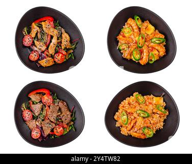 Vier verschiedene asiatische Gerichte mit Reis, Huhn, Rindfleisch und Garnelen in schwarzen Schüsseln, isoliert auf weißem Hintergrund Stockfoto